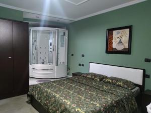 Voodi või voodid majutusasutuse Andi guest house toas