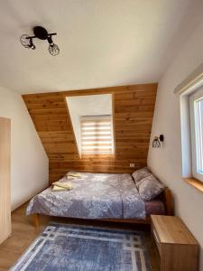 Postel nebo postele na pokoji v ubytování Holiday Home Apartman Aco