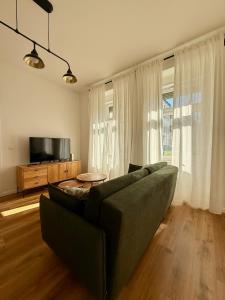 Μια τηλεόραση ή/και κέντρο ψυχαγωγίας στο Apartament Mariański