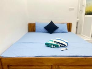 Voodi või voodid majutusasutuse Trinco Sailu Inn toas