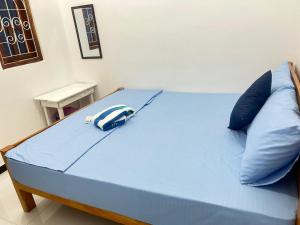 Postel nebo postele na pokoji v ubytování Trinco Sailu Inn + 10 fotografií