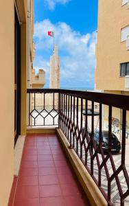 a balcony with a view of the city at Kasa Kastelo by Férias in Figueira in Figueira da Foz