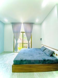 En eller flere senge i et værelse på HG House