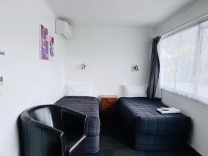 Posezení v ubytování Brooklyne Motel Sanson