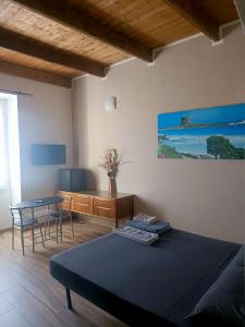 TV a/nebo společenská místnost v ubytování B&B L'Antico Portico