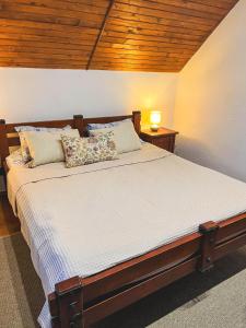 En eller flere senge i et værelse på Вілла Білий Бізон Хмелева