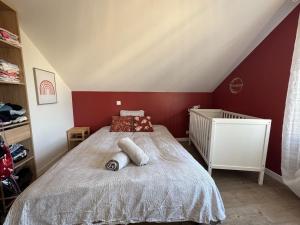 Katil atau katil-katil dalam bilik di Le Racing Lodge - 4pers - Wi-fi