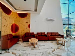 The Woods Farmhouse Resort, Jim Corbett - A beautiful wellness resort in the lap of nature的休息区