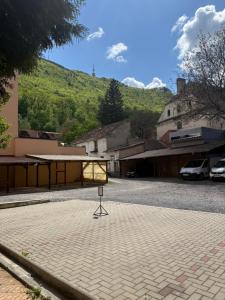 a stage in the middle of a street with a mountain at Toni s Luxury Central Place in Braşov