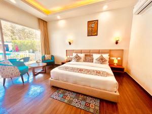 The Woods Farmhouse Resort, Jim Corbett - A beautiful wellness resort in the lap of nature客房内的一张或多张床位