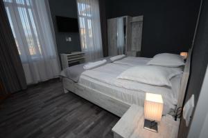 Voodi või voodid majutusasutuse Hotel Terrace Rabath toas