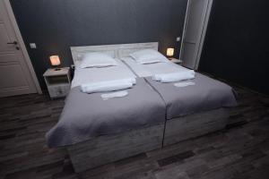 Voodi või voodid majutusasutuse Hotel Terrace Rabath toas