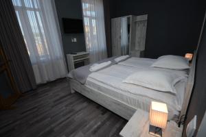 Voodi või voodid majutusasutuse Hotel Terrace Rabath toas