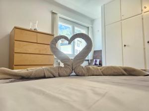 Postel nebo postele na pokoji v ubytování Leukerfun
