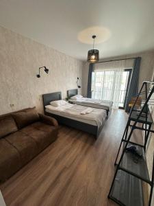 Voodi või voodid majutusasutuse Hotel Terrace Rabath toas