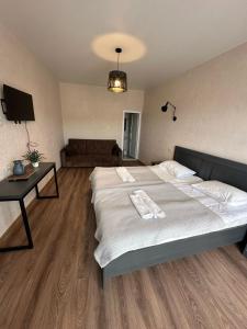 Voodi või voodid majutusasutuse Hotel Terrace Rabath toas