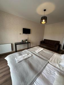 Voodi või voodid majutusasutuse Hotel Terrace Rabath toas