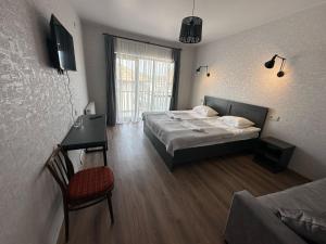 Voodi või voodid majutusasutuse Hotel Terrace Rabath toas