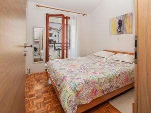 Ein Bett oder Betten in einem Zimmer der Unterkunft Apartment Iva