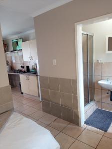 Dapur atau dapur kecil di Accommodation@Park1285