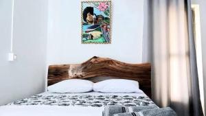 Katil atau katil-katil dalam bilik di Sool chez l'habitant