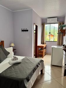 Postel nebo postele na pokoji v ubytování Hotel Lumiar