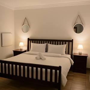 Ένα ή περισσότερα κρεβάτια σε δωμάτιο στο Ikhaya Lakho - 1 +76 φωτογραφίες