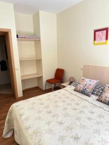 Ένα ή περισσότερα κρεβάτια σε δωμάτιο στο Apartamentai Vetrungiu g 3