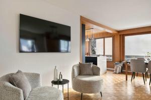 TV/Unterhaltungsangebot in der Unterkunft Luxe Davos Residence with Views Private Balcony