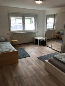 Ένα ή περισσότερα κρεβάτια σε δωμάτιο στο Obermain Apartment