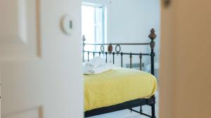 Letto o letti in una camera di Villa Boufla