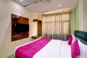 Postel nebo postele na pokoji v ubytování Hotel Snow White Inn - Paharganj New Delhi