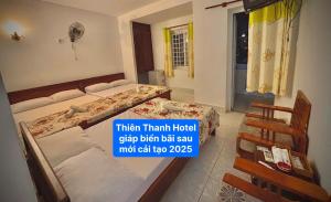 Postel nebo postele na pokoji v ubytování Blue Ocean Hotel - Thiên Thanh - sát bãi sau