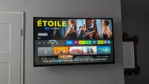 a flat screen tv hanging on a wall at Applewood Hotel in Bournemouth
