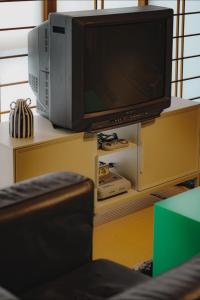TV a/nebo společenská místnost v ubytování Unique City Pop Retreat 5 star Location, Game Room