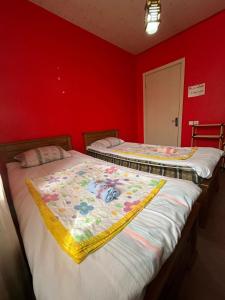 Postel nebo postele na pokoji v ubytování Guest House Barbi