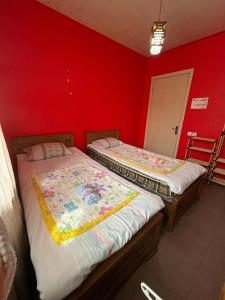 Postel nebo postele na pokoji v ubytování Guest House Barbi