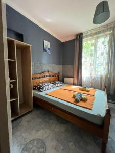Postel nebo postele na pokoji v ubytování Guest House Barbi