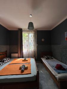 Postel nebo postele na pokoji v ubytování Guest House Barbi