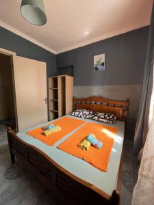 Postel nebo postele na pokoji v ubytování Guest House Barbi