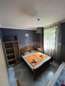 Postel nebo postele na pokoji v ubytování Guest House Barbi