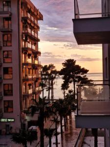 a view of the ocean from a building at AURORA Apartment Shëngjin Kune in Shëngjin