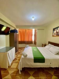 Katil atau katil-katil dalam bilik di Hotel San Eduardo +2 gambar