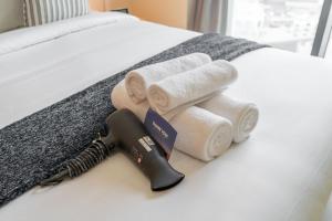Ein Bett oder Betten in einem Zimmer der Unterkunft Prime Studio in Jumeirah Bay X1 in JLT - Sleeps 2