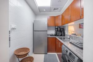 Küche/Küchenzeile in der Unterkunft Prime Studio in Jumeirah Bay X1 in JLT - Sleeps 2