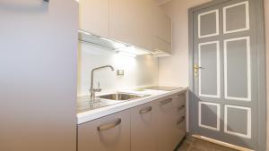 Kuchyň nebo kuchyňský kout v ubytování Residenza Deriu - Bosa by Sardinianworld + 91 fotografií