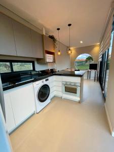 Kuchyň nebo kuchyňský kout v ubytování Container - Gruta Bom Sucesso - Moradas da Serra