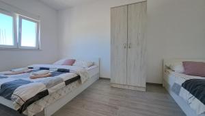 Fotografija u galeriji objekta Apartmani Neuense u Neumu +35 fotografija