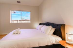 Light-Filled Werribee Escape客房内的一张或多张床位
