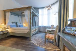 Postel nebo postele na pokoji v ubytování Best Western Plus Theodor Storm Hotel + 37 fotografií